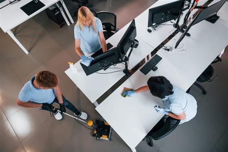 Workers cleaning am office